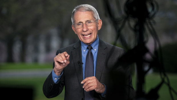 Dr Anthony Fauci, director of the National Institute of Allergy and Infectious Diseases, speaks during a television interview at the White House.