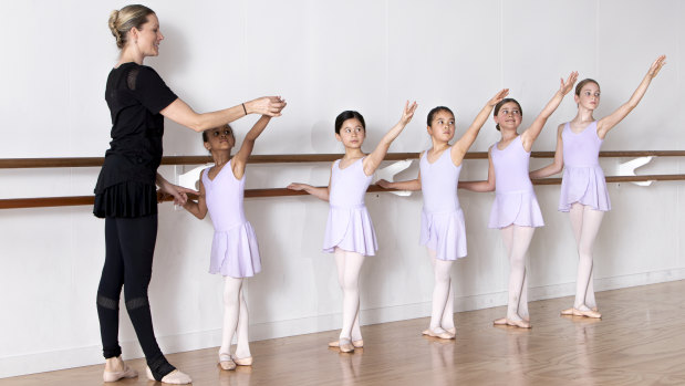 Dance teacher Rain Francis instructs pupils. 