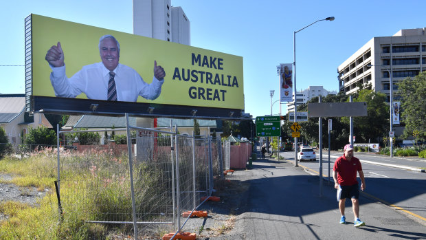 While Clive Palmer's court woes continue, hie has taken out billboards across Australia. This one is in the Brisbane suburb of Woolloongabba.