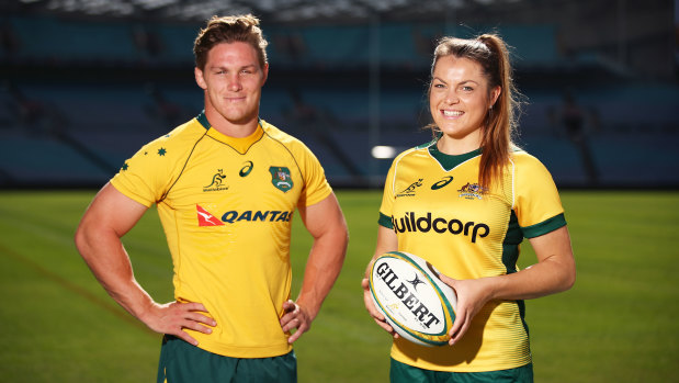 Crowd pleasers: Michael Hooper of the Wallabies and Grace Hamilton of the Wallaroos at ANZ Stadium yesterday.
