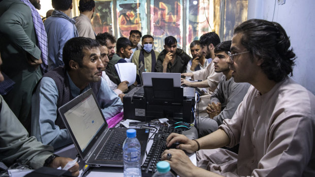 Afghans in the Herat Kabul internet cafe. 