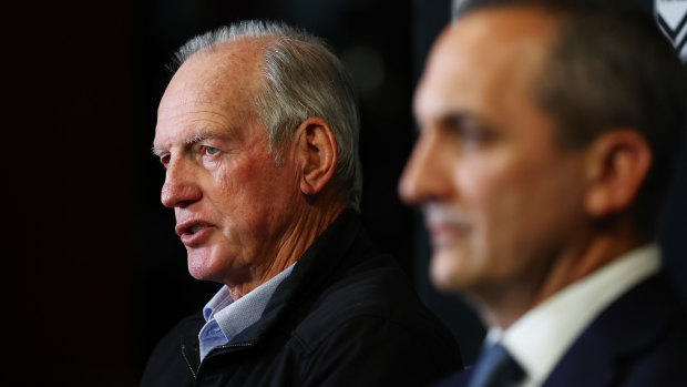 Wayne Bennett speaks to media with NRL chief Andrew Abdo.