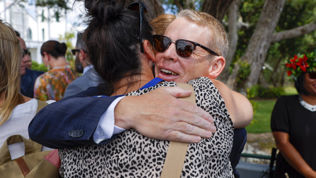 Labor Party leader-elect and Prime Minister Chris Hipkins hugs a friend at a Rattana celebration.