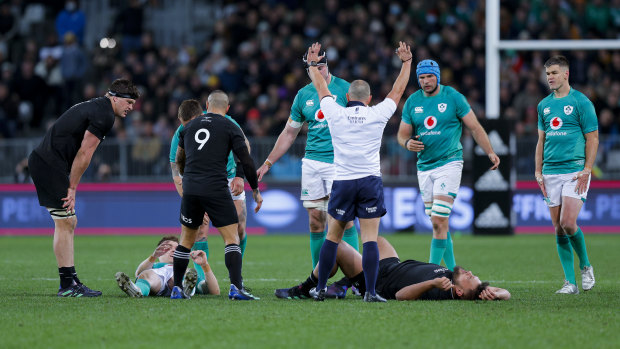 Ireland’s Garry Ringrose and New Zealand’s Angus Ta’avao on the ground after a head-on-head collision.