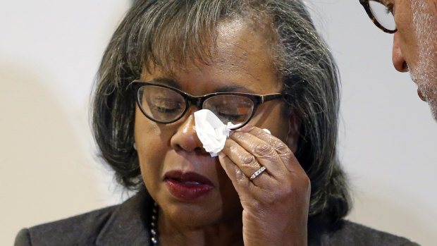 Anita Hill, who testified in 1991 that Supreme Court nominee Clarence Thomas had sexually harassed her, cries after speaking at a university on Wednesday. 