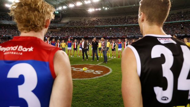 Garry Lyon, Tony Lockett and Stewart Loewe address players and the crowd in honour of Danny Frawley.