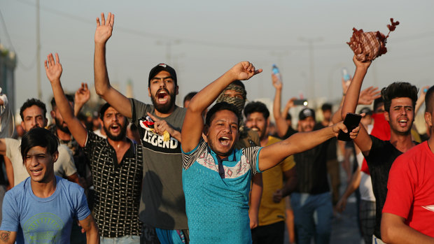 Iraqi security forces fired live bullets into the air and used tear gas against a few hundred protesters in central Baghdad.