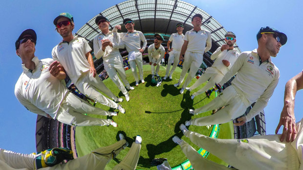 Circling in: The Australian team huddle on the MCG during day four of the Boxing Day Test.