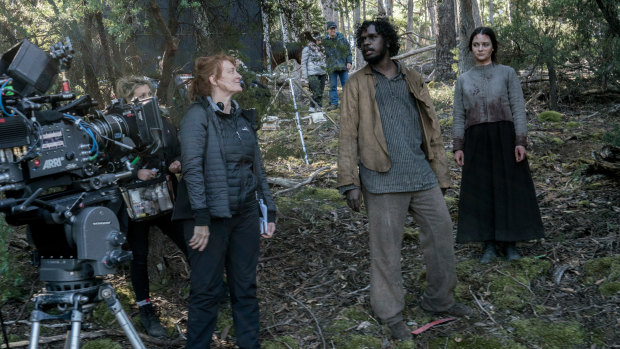 Writer-director Jennifer Kent, left, directs Baykali Ganambarr and Aisling Franciosi on the Tasmanian set of The Nightingale. 