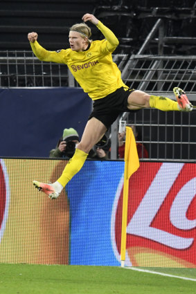 Erling Haaland celebrates scoring Dortmund’s second goal.