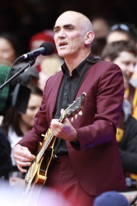 Paul Kelly performing at the 2012 Grand Final at the MCG.