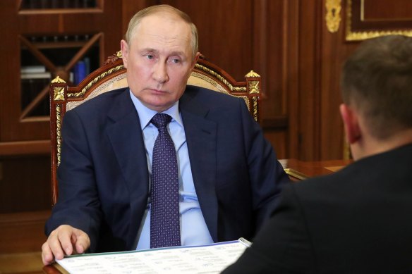 In a corner: Russian President Vladimir Putin.