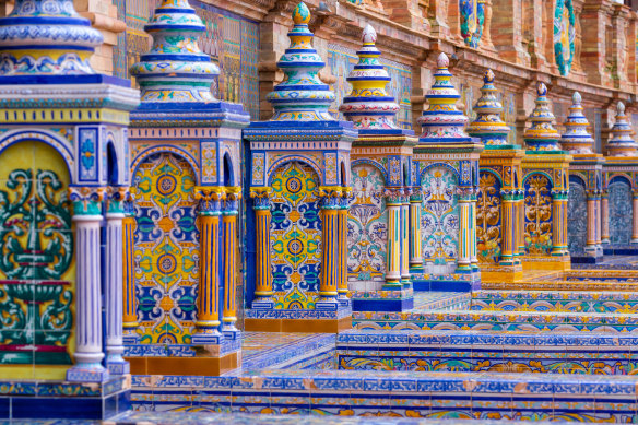 Vibrant multi-coloured benches of the famous Seville square, Plaza de Espana.