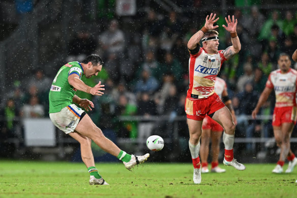 Jordan Rapana kicks the match-winning field goal for the Canberra Raiders against the Dolphins.