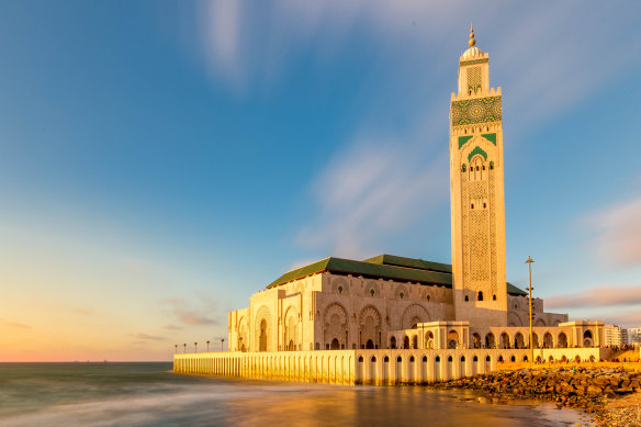 Hassan II Mosque juts out over the ocean in Casablanca.