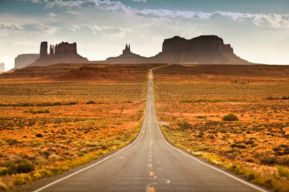 The iconic stretch of Route 163 in Monument Valley offers a view looking northbound towards the Utah-Arizona border.