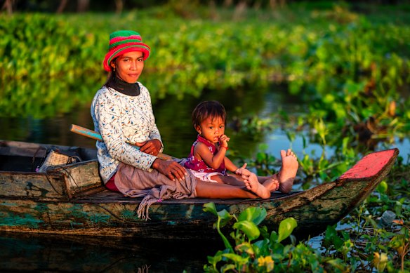 A young mother and daughter on Cambodia’s Tonle Sap, South-East Asia’s largest freshwater lake.