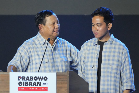 Prabowo Subianto and Gibran Rakabuming Raka claiming victory on the night of February 14.