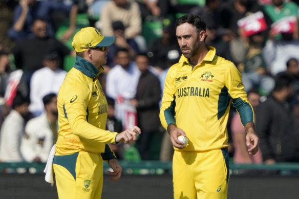 Australia’s Glenn Maxwell, right, chats with Steve Smith.