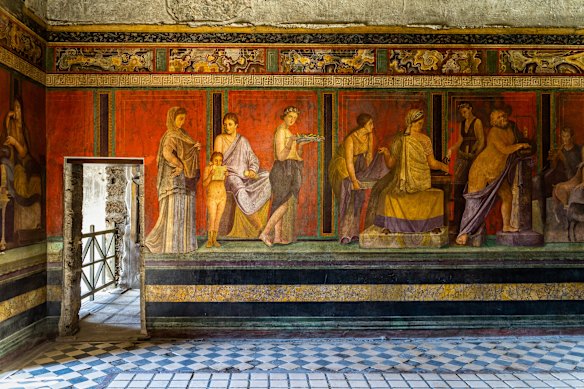 The frescoes of Villa dei Misteri (Villa of the Mysteries) inside an ancient Roman villa in Pompeii.