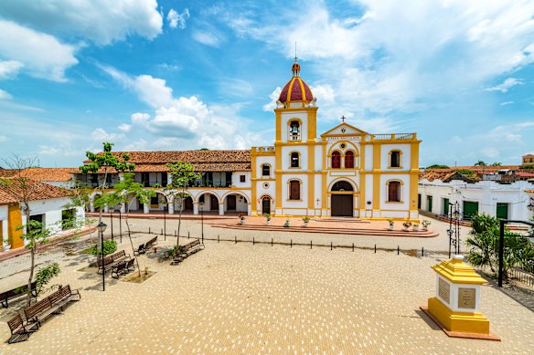 The Church of the Immaculate Conception is situated directly on the historic main plaza facing Magdalena River.