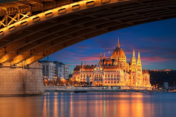 Sunset falls over Budapest’s Margaret Bridge, spanning the mighty Danube.