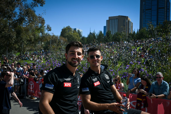 Josh and Nick Daicos soak up the atmosphere.