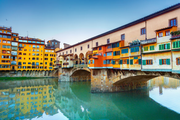 Ponte Vecchio straddles the Arno River.