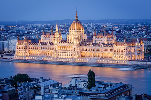 Cups to cupolas: Budapest’s landmark Parliament building is set by the Danube River which passes through the capital.