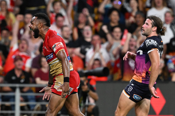 Hamiso Tabuai-Fidow of the Dolphins celebrates scoring a try against the Broncos on Friday night. A record stand-alone crowd for a club game of 51, 047 attended the Broncos’ 18-12 win at Suncorp Stadium.