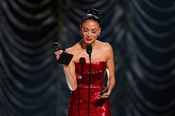 Nicole Scherzinger accepts the award for best performance by an actress in a leading role in a musical during the 78th Tony Awards.