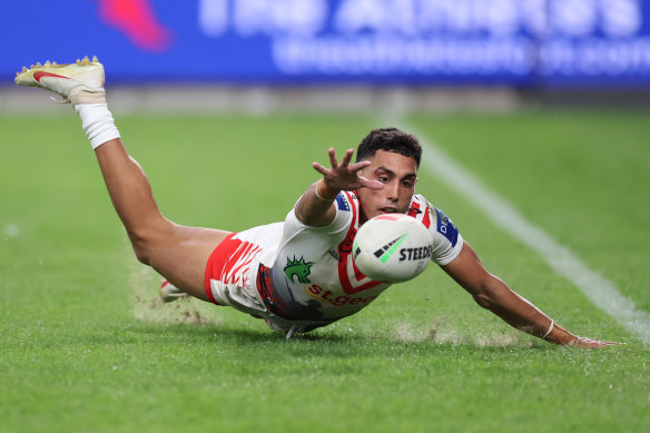 Tyrell Sloan attempts to score against the Roosters on Tuesday.