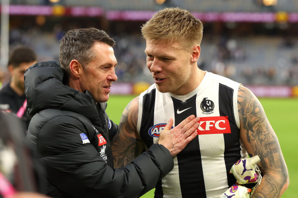 Craig McRae with Jordan De Goey after Collingwood’s win over West Coast.