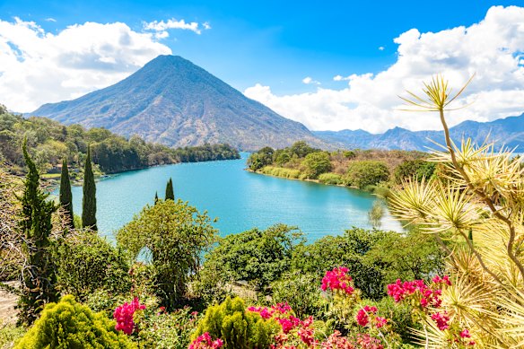 Lake Atitlan with a view to Volcano San Pedro in the highlands of Guatemala.