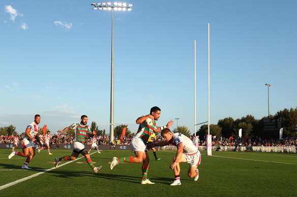 Cody Walker runs at Matt Dufty during the Charity Shield match in Mudgee.