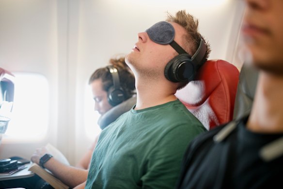Remaining seated for long periods on flights can cause your back to get sore.