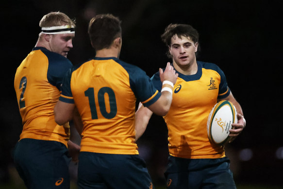 Teddy Wilson celebrates with Junior Wallabies teammates in 2023.