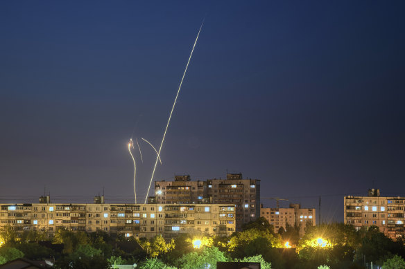 Russian rockets are launched against Ukraine from Russia’s Belgorod region, seen from Kharkiv, Ukraine, late on Sunday.