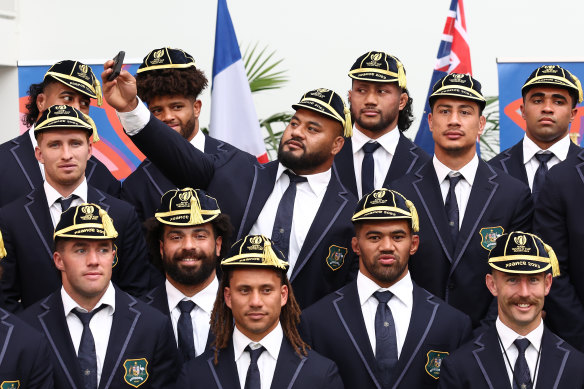 Taniela Tupou takes a photograph during Australia’s official Rugby World Cup welcome ceremony. 