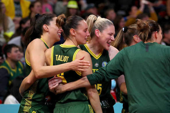 Lauren Jackson of Australia celebrates with team mates after their win over Belgium.