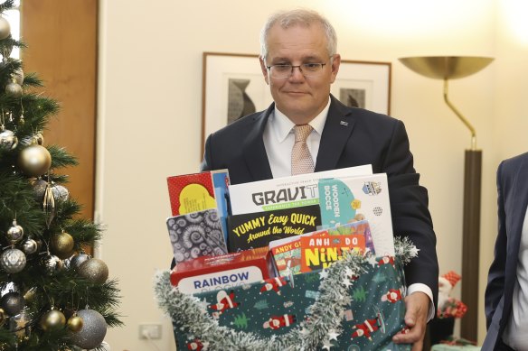 Prime Minister Scott Morrison and his box of toys.