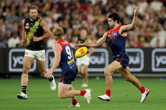 Christian Petracca drives the Demons forward against Richmond.