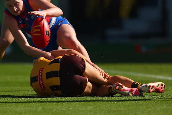 Emily Bates after sustaining the knee injury in a tackle.