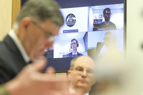 A video conference on COVID-19 in July 2021, including ATAGI co-chairs Christopher Blyth and Allen Cheng.