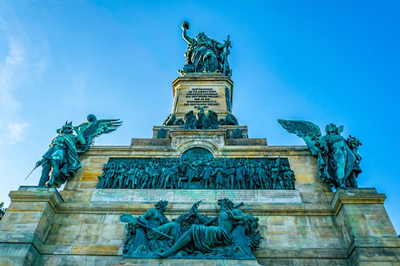 The Niederwalddenkmal  stands on a hill  above Ruedesheim am Rhein, Germany.