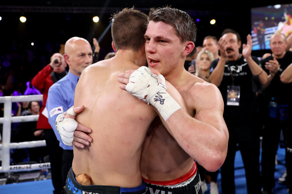 Nikita Tszyu and Ben Horn embrace after their bout at the Hordern Pavilion. 