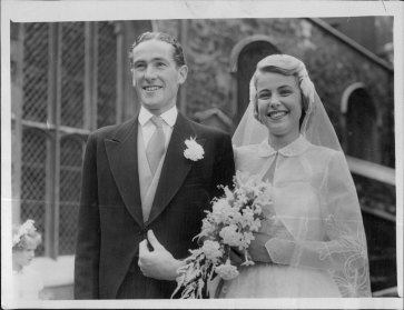 Richard Woolcott with his bride Birgit Christensen, of Copenhagen, Denmark, leaving the Savoy Chapel after their wedding. 