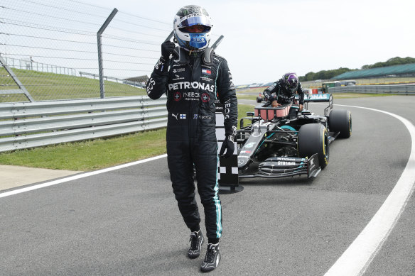 Valtteri Bottas celebrates taking pole ahead of teammate Lewis Hamilton.