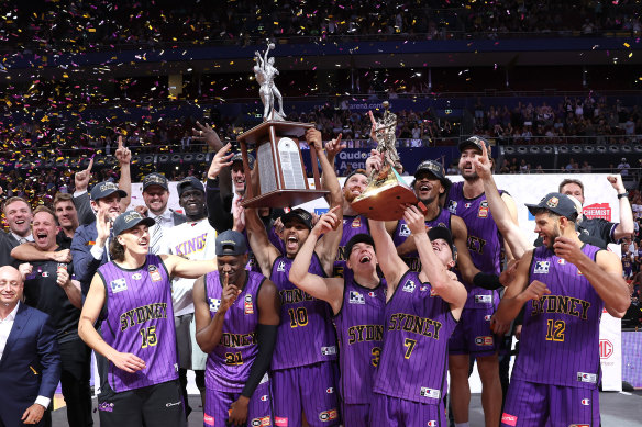 Sydney Kings players celebrate their series win over New Zealand Breakers.