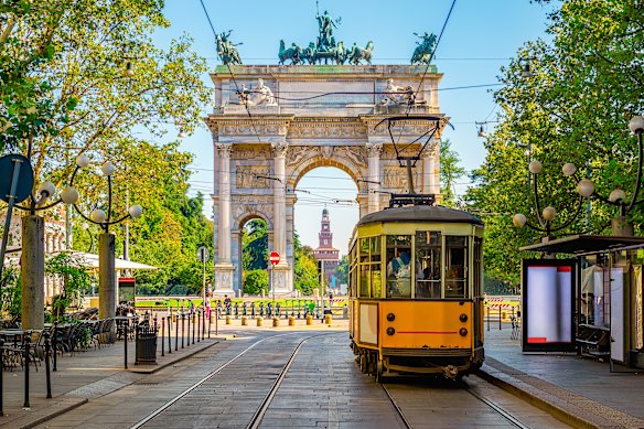 Milan’s Peace Arch with one of the Winter Olympic city’s classic yellow trams.